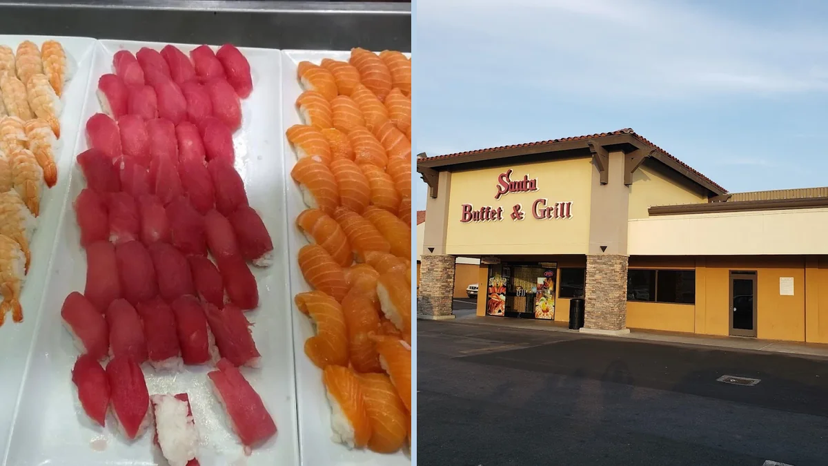 Warm buffet counter with meats and salads.